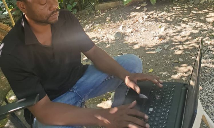 Phares at work in his backyard